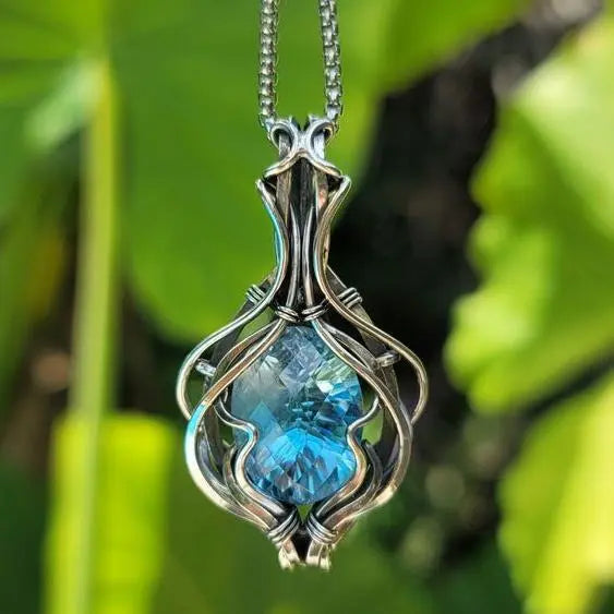 Vintage Silver Pendant Necklace with Blue Faceted Gemstone