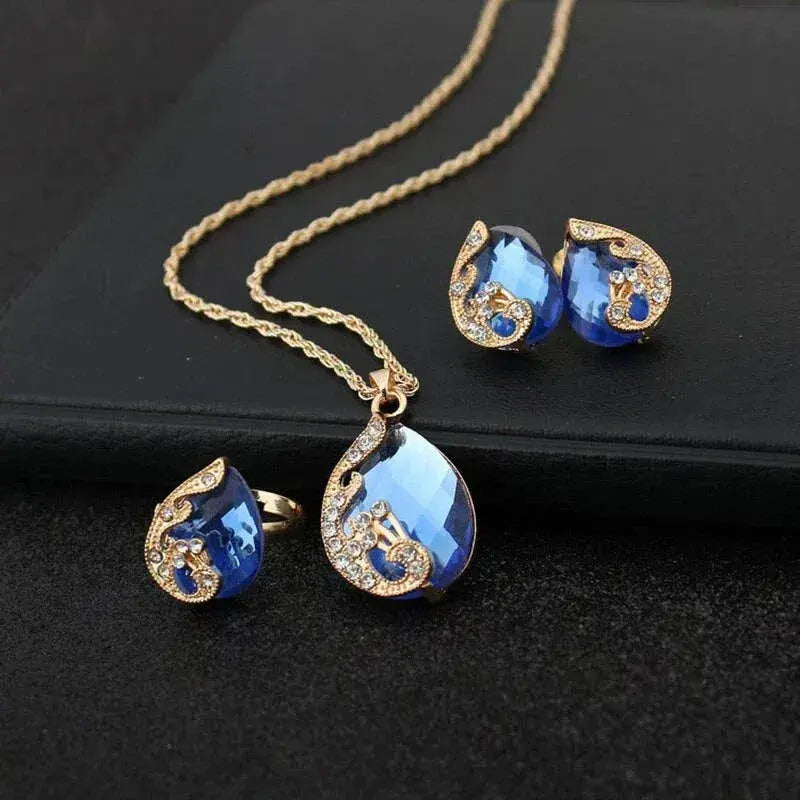 Blue Crystal Necklace + Earrings Set in Gold