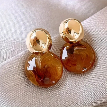 Golden Swirl Drop Earrings in Amber Tone