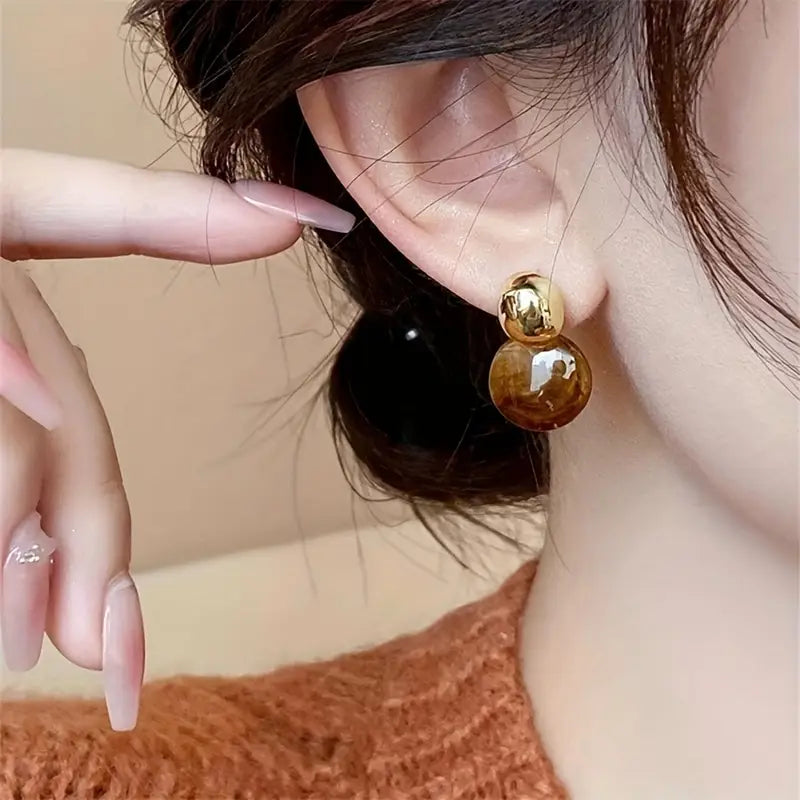 Golden Swirl Drop Earrings in Amber Tone