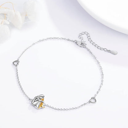 Dog Embrace Charm Bracelet in Silver and Gold Tones