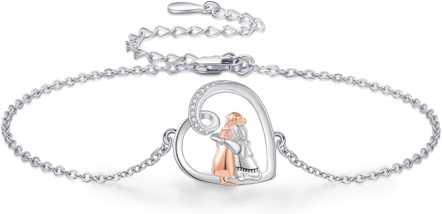Dog Embrace Charm Bracelet in Silver and Gold Tones