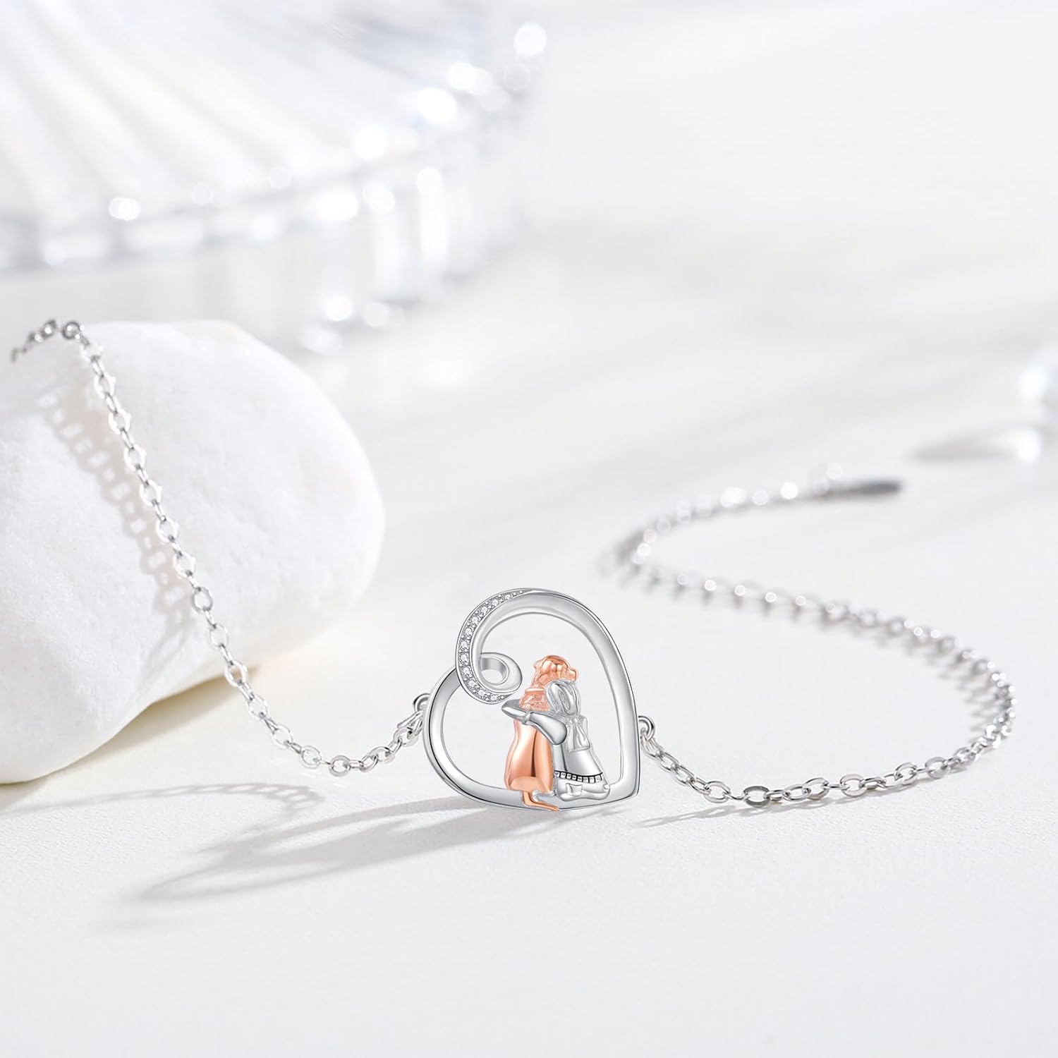 Dog Embrace Charm Bracelet in Silver and Gold Tones