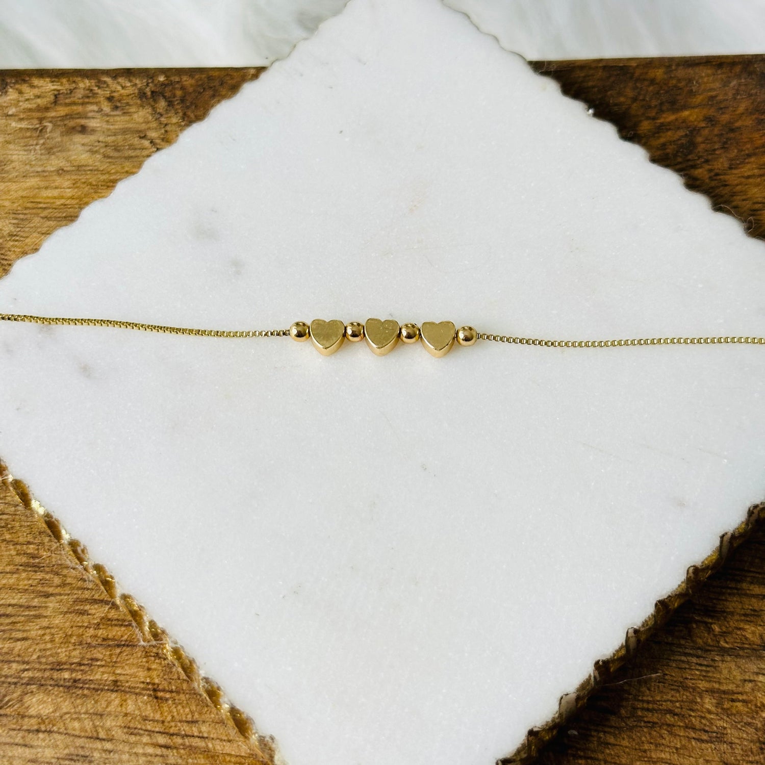 Sunburst Heart Necklace in Gold Tone