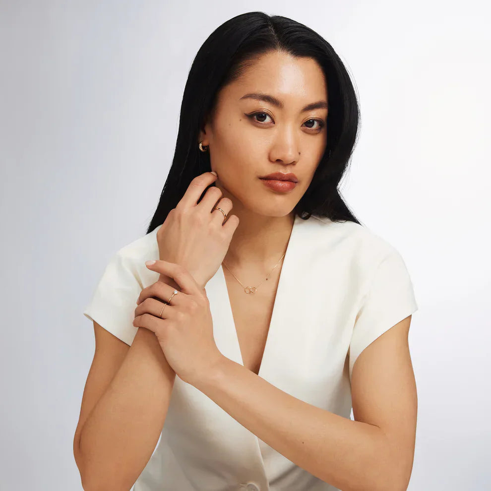 Solitaire Accent Ring in Gold with Sparkling Stone