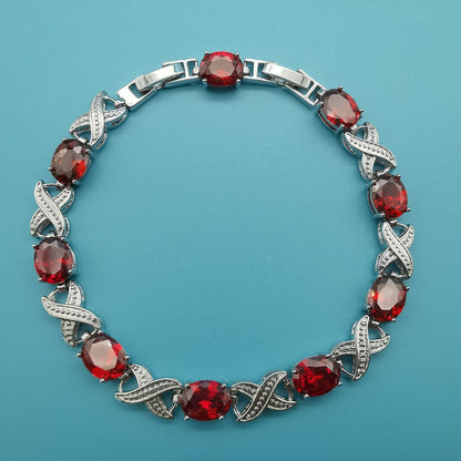 Infinity Link Bracelet with Red Crystals