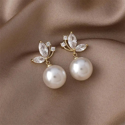 Pearl Drop Earrings with Crystal Leaf Detail in Gold