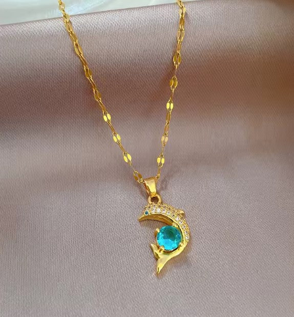 Dolphin Necklace in Gold with Blue Gemstone