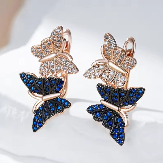 Butterfly Drop Earrings in Rose Gold with Blue and Crystal Accents