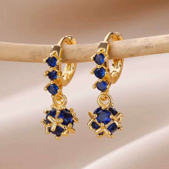 Gold Hoop Earrings with Blue Gem Accents