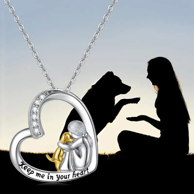 Heart-Shaped Girl and Dog Embrace Necklace with Gold-Tone Detail