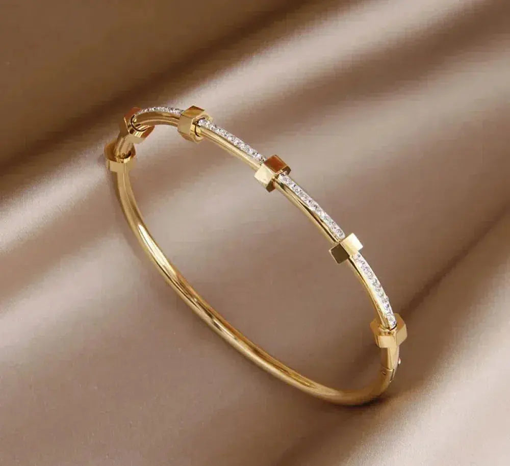 Geometric Gold Bangle with Shimmering Accents
