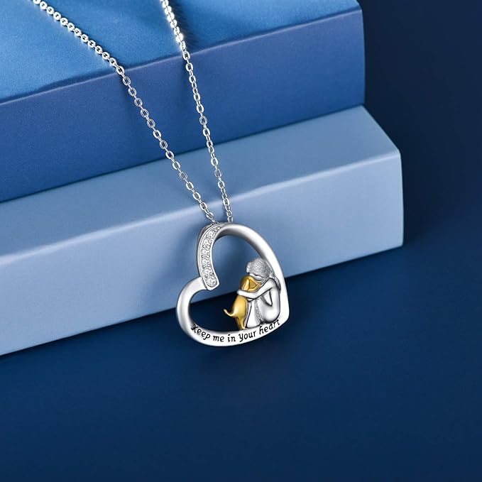 Heart-Shaped Girl and Dog Embrace Necklace with Gold-Tone Detail