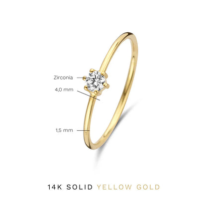 Solitaire Accent Ring in Gold with Sparkling Stone