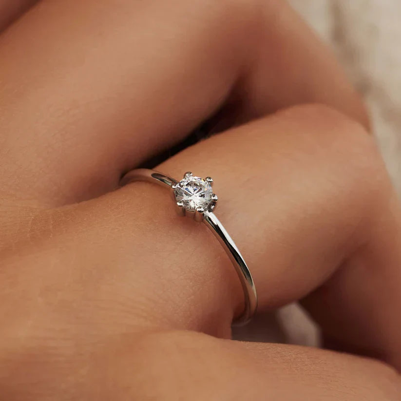 Delicate Solitaire Ring with Sparkling Centerpiece