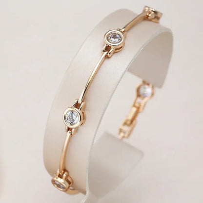 Elegant Gold Bracelet with Shimmering Zirconias